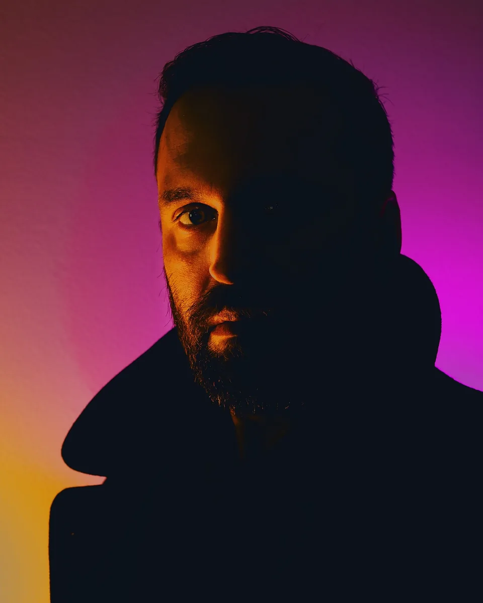 Peacoat and gelled light, cyberpunk portrait
