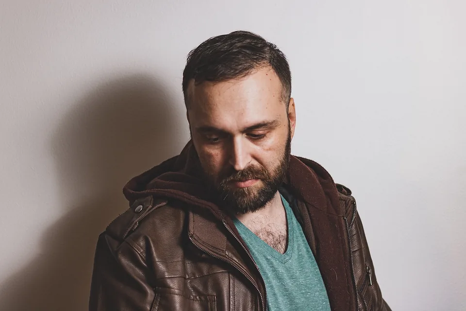 Contemplative portrait, leather jacket