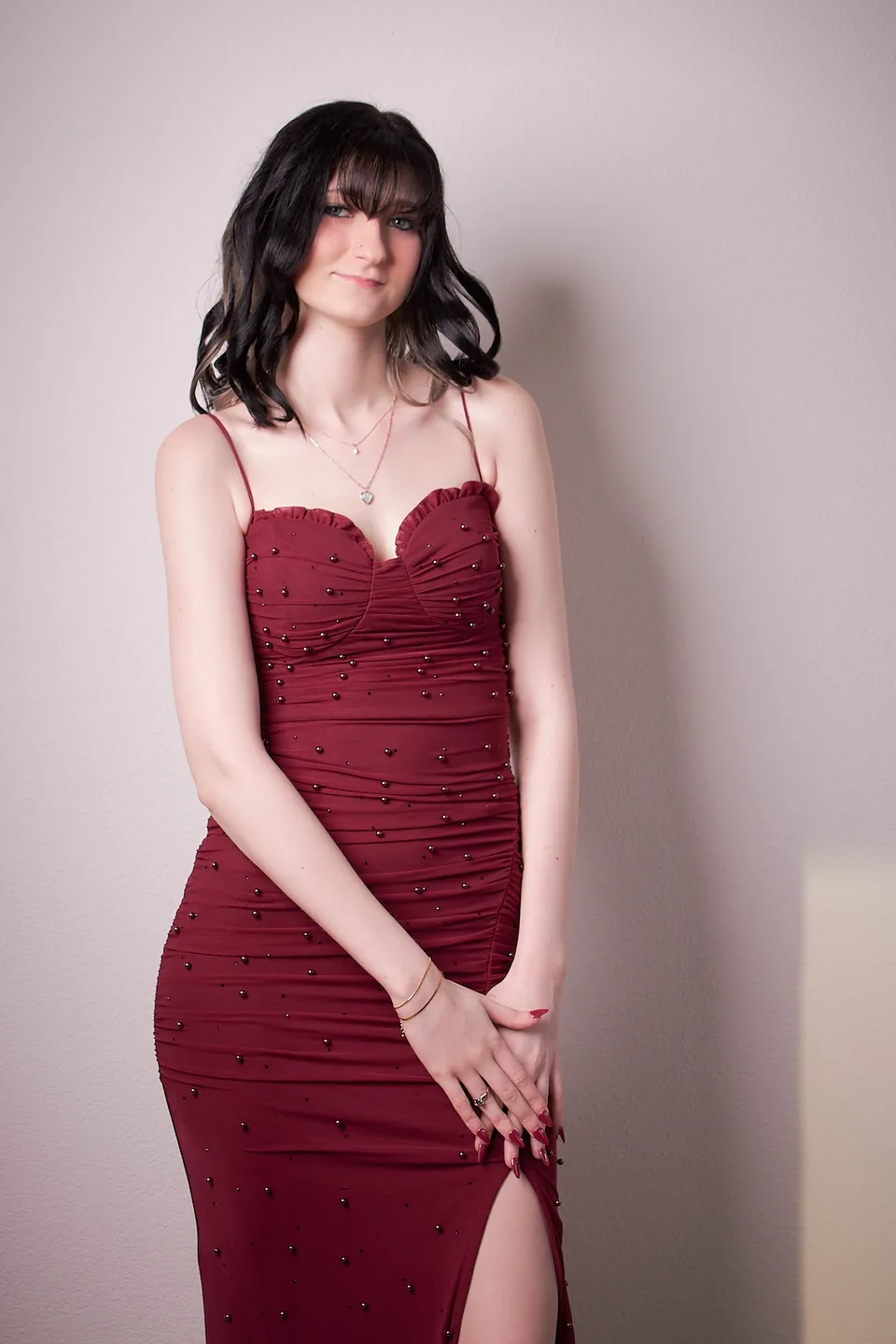 Studio portrait in a red dress
