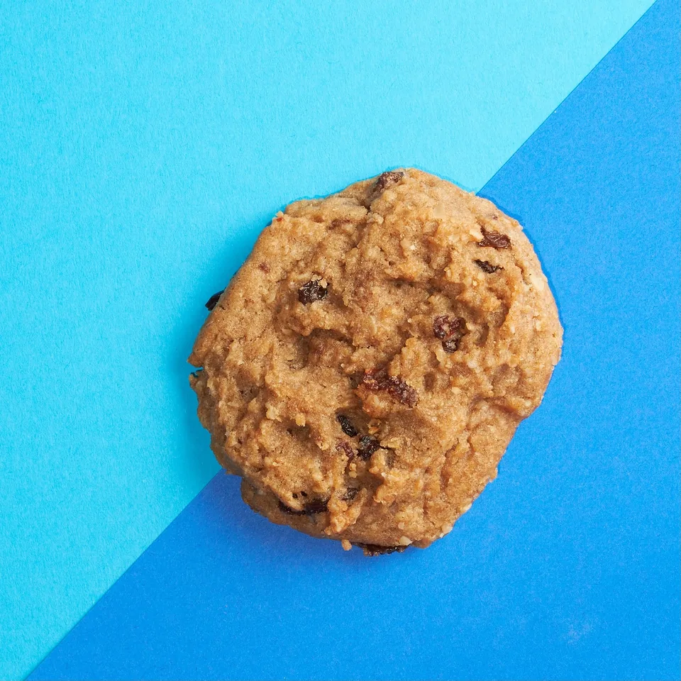 Cookie on a split blue background