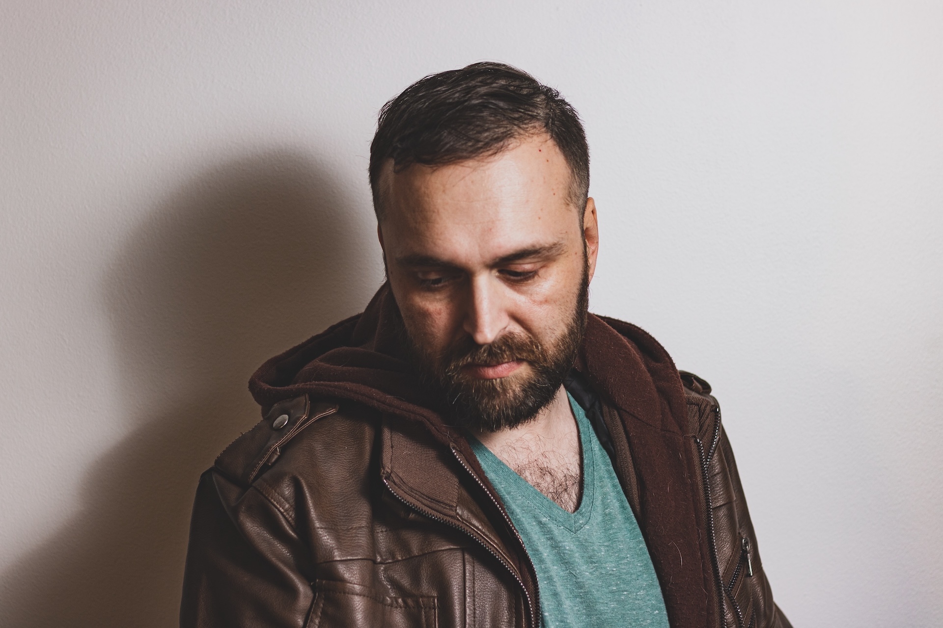 Contemplative portrait, leather jacket