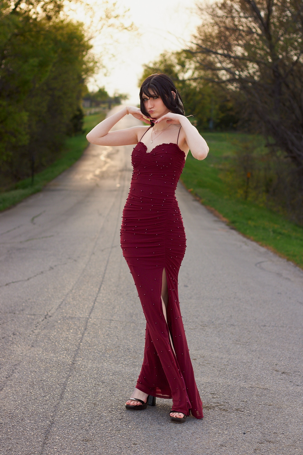 Outdoor portrait at golden hour on open road